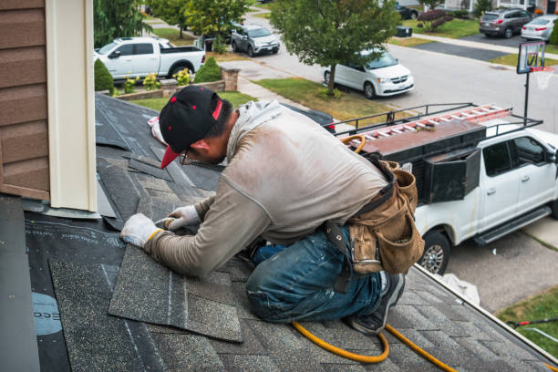 Professional Roof Replacement technician working in Central Islip, NY